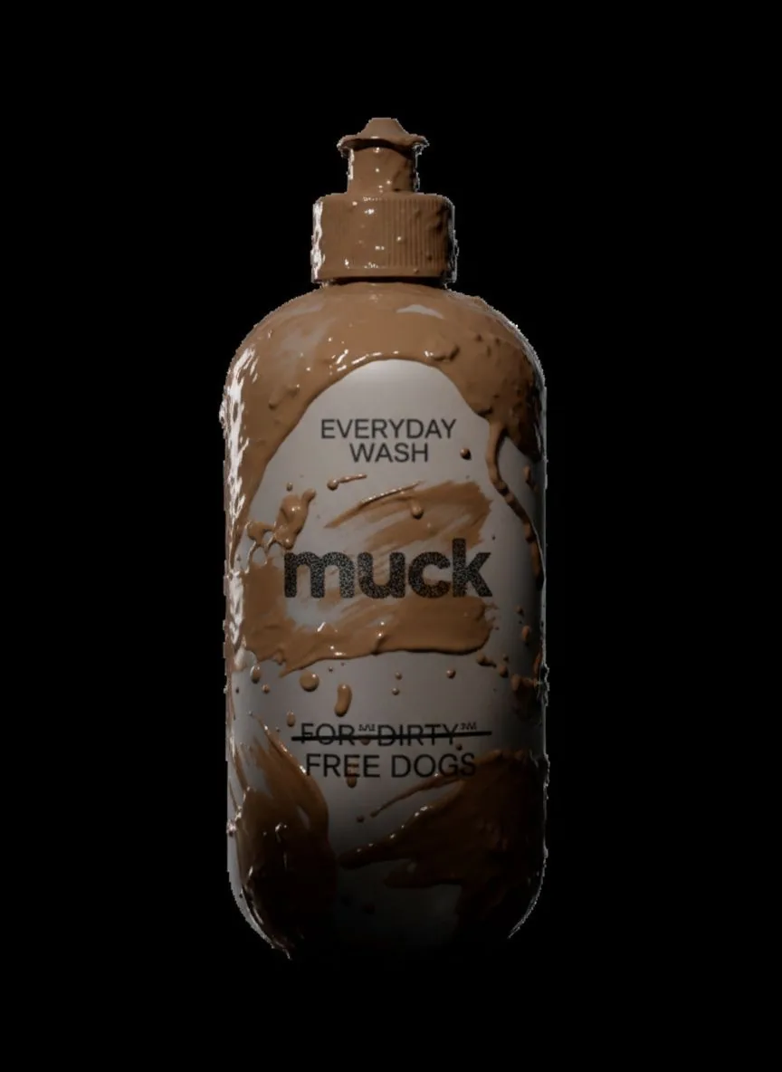 Front label of the bottle under thick mud, reading Everyday Wash, muck, and For dirty-free dogs with dirty-free struck through.