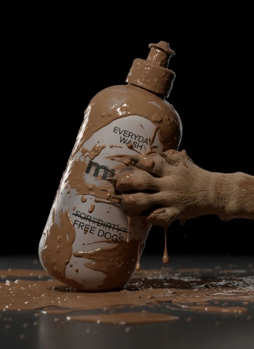 A muddy dog's paw pressed against the mud-covered bottle as it tips over into a puddle.